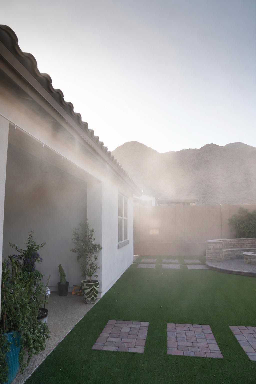 High-pressure patio misting system running at an Arizona home